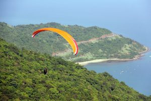 paragliding from the top of the mountain in son tra peninsula saigon riders