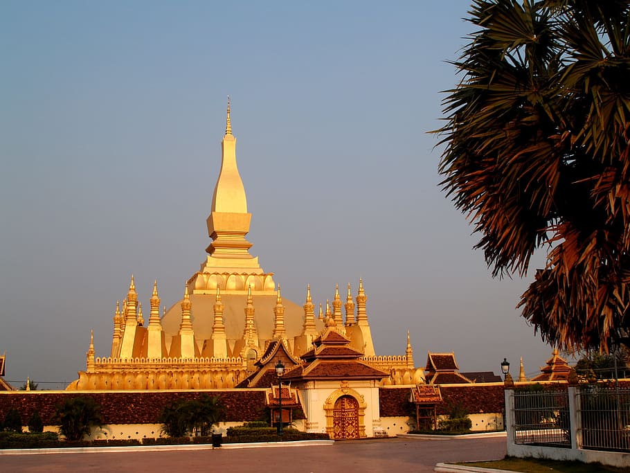 golden pagoda pagoda wat pha that luang vientiane