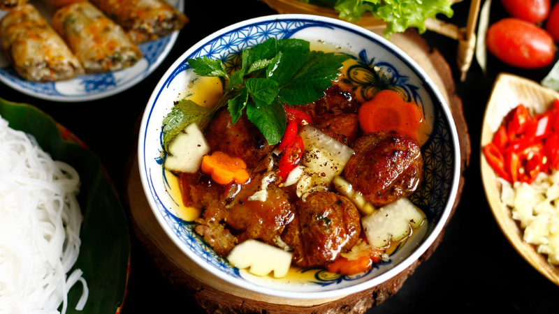 Top 6 Must-Try Hanoi Food Tour Experiences for an Unforgettable Culinary Journey 5 Bun cha: Hanoi’s smoky, savory lunchtime classic — best enjoyed with herbs and history