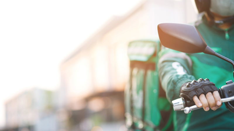 Booking Grab ride and navigating with Google Maps in busy Vietnam streets